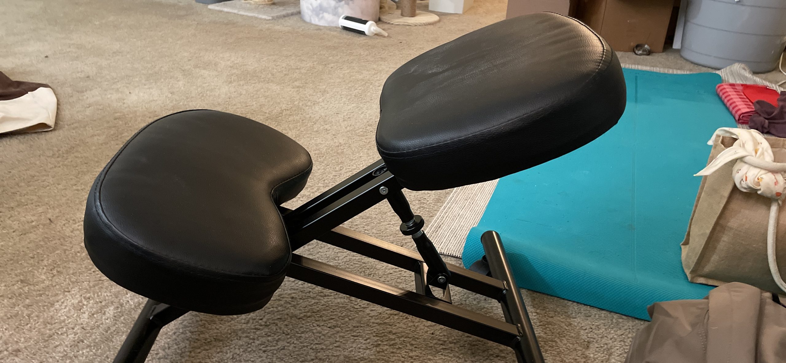 Yaheetech Ergonomic Kneeling Chair, Adjustable Rolling Knee Stool, Black | Thick foam cushions in faux leather support an upright posture; the metal frame tilts 91-130 degrees and rolls on casters customer photo 2