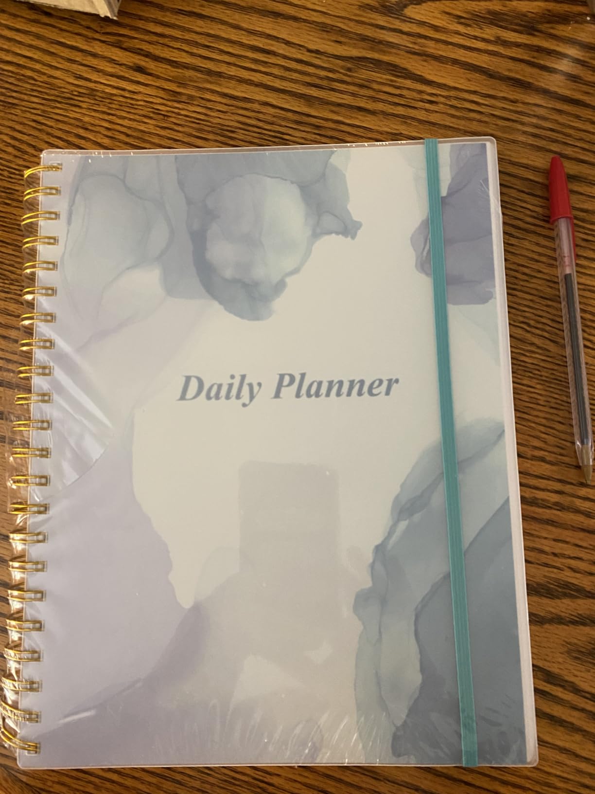 Daily Planner Undated - A4 To Do List Notebook Hourly Schedules, Spiral Appointment Planner for Women and Men, PVC Hardcover, Inner Pocket, Elastic Closure, 8.5
