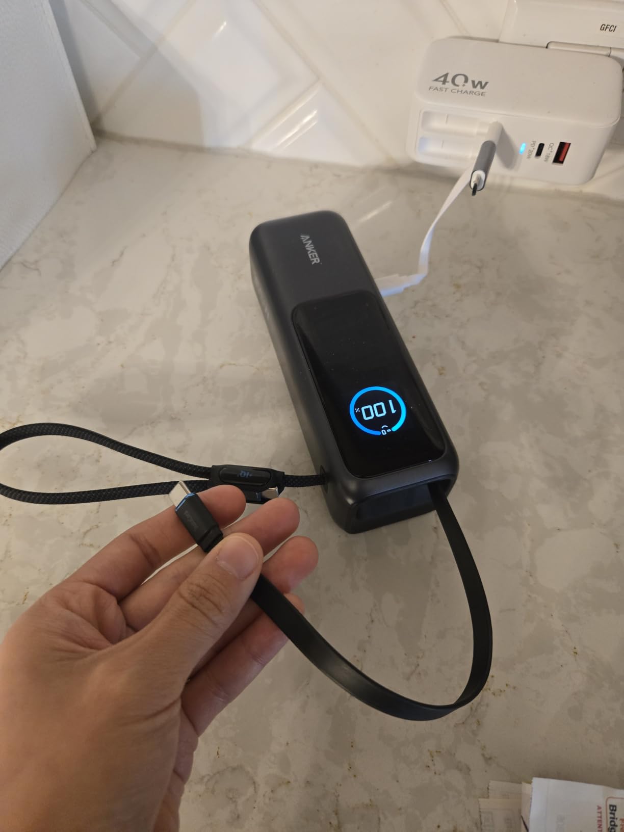 Anker Laptop Power Bank, 25,000mAh Portable Charger with 165W Total Output, 3 USB-C Ports (100W Max Each), Built-in Retractable Cables, Flight-Ready customer photo 1
