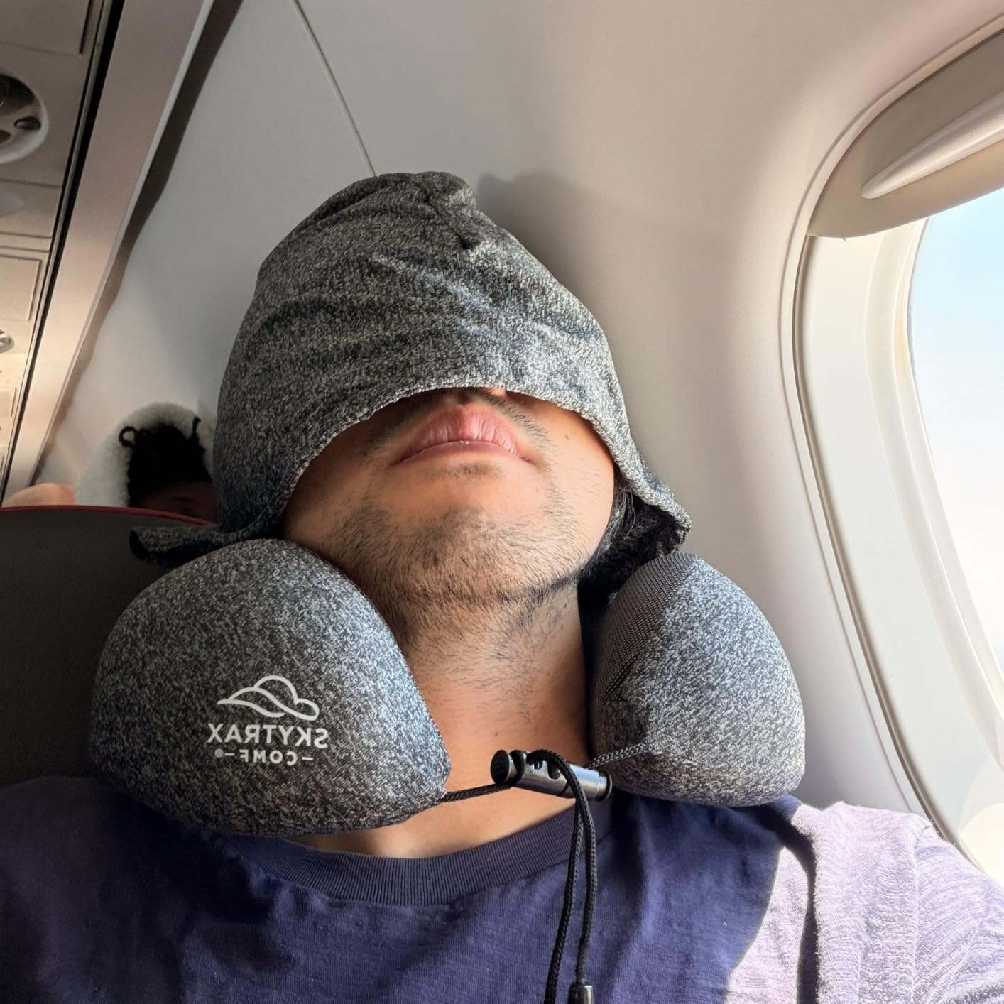 SkytraxComf Travel Neck Pillow with Hood for Privacy on Long Flights - Memory Foam, Airplane Sleep, Safety-Tested Materials, Extra Large Hood, Chin Support, Earplugs, Washable Cover customer photo 1