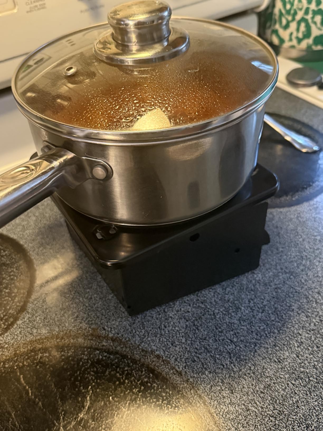 Coghlan's Portable Folding Camp Stove – Compact, Lightweight Steel Cooking Stove for Camping, Backpacking, Hiking, or Emergency Use – Uses Canned Heat or Fuel Tablets, Black customer photo 1