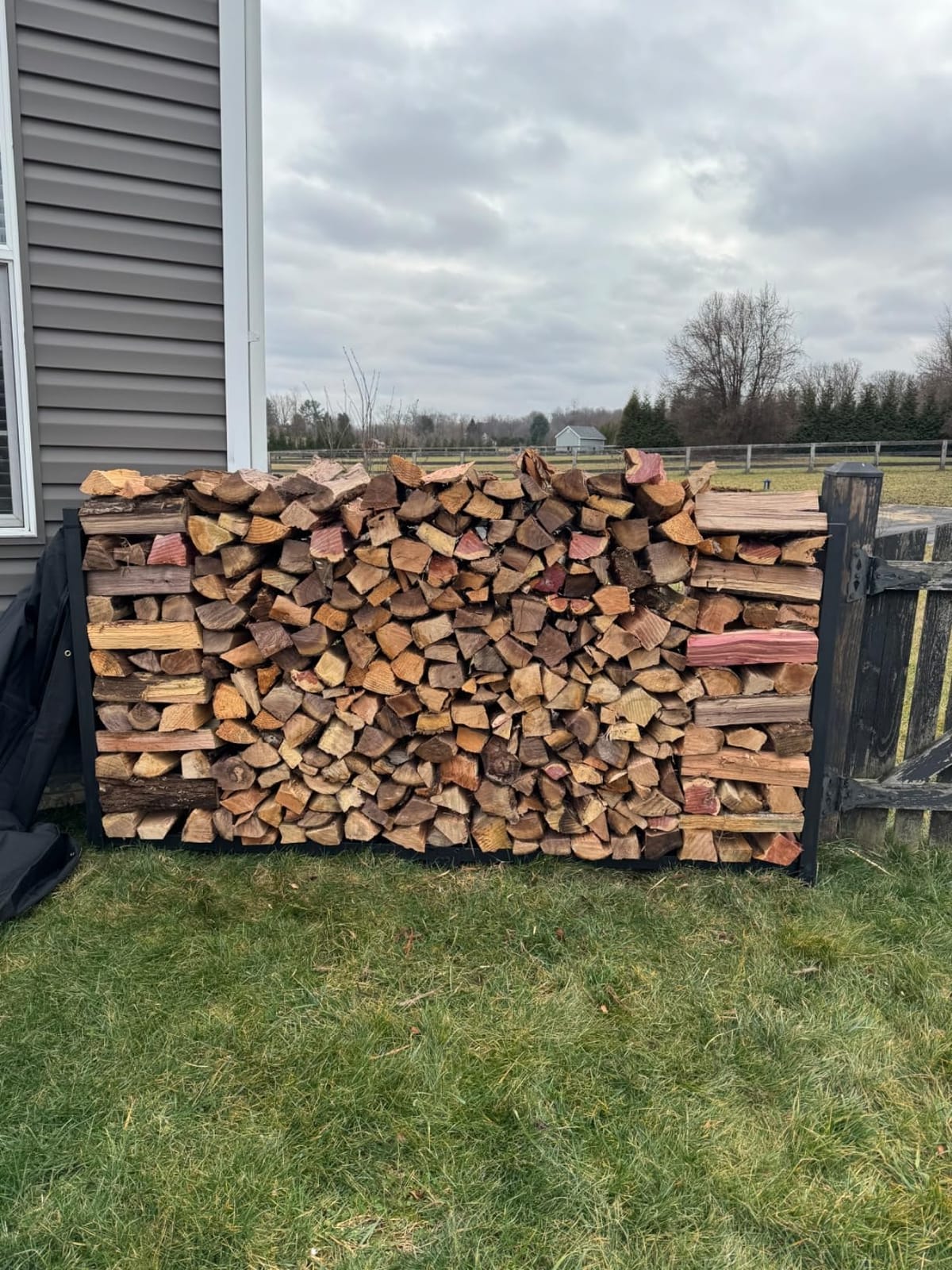 Woodhaven 8-Foot Raised Firewood Rack w/Cover, 1/2 Cord | Made in USA customer photo 1