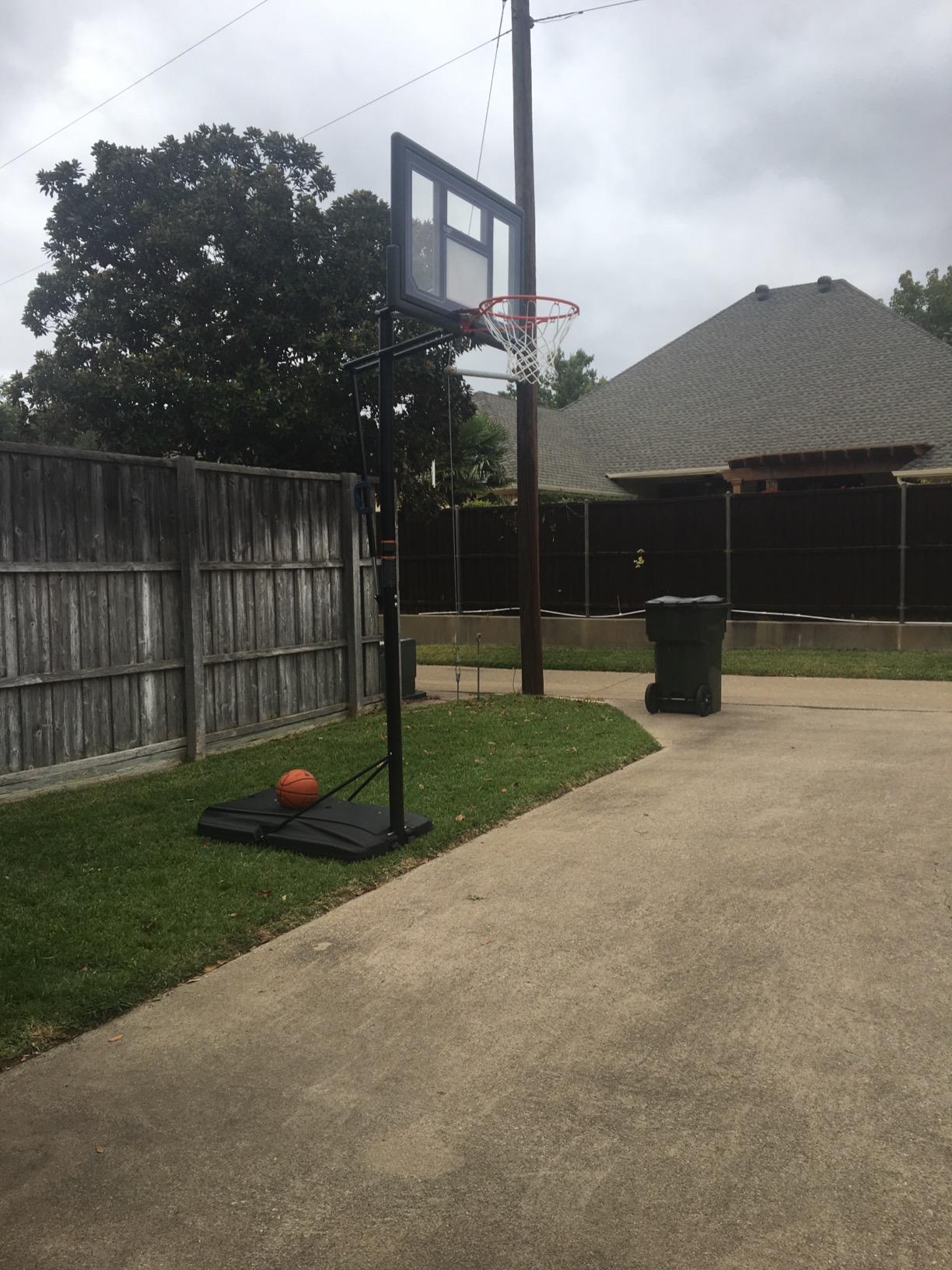 Lifetime 1529 Courtside Height Adjustable Portable Basketball System, 50 Inch Shatterproof Backboard, Black/Red/Blue, Standard customer photo 1