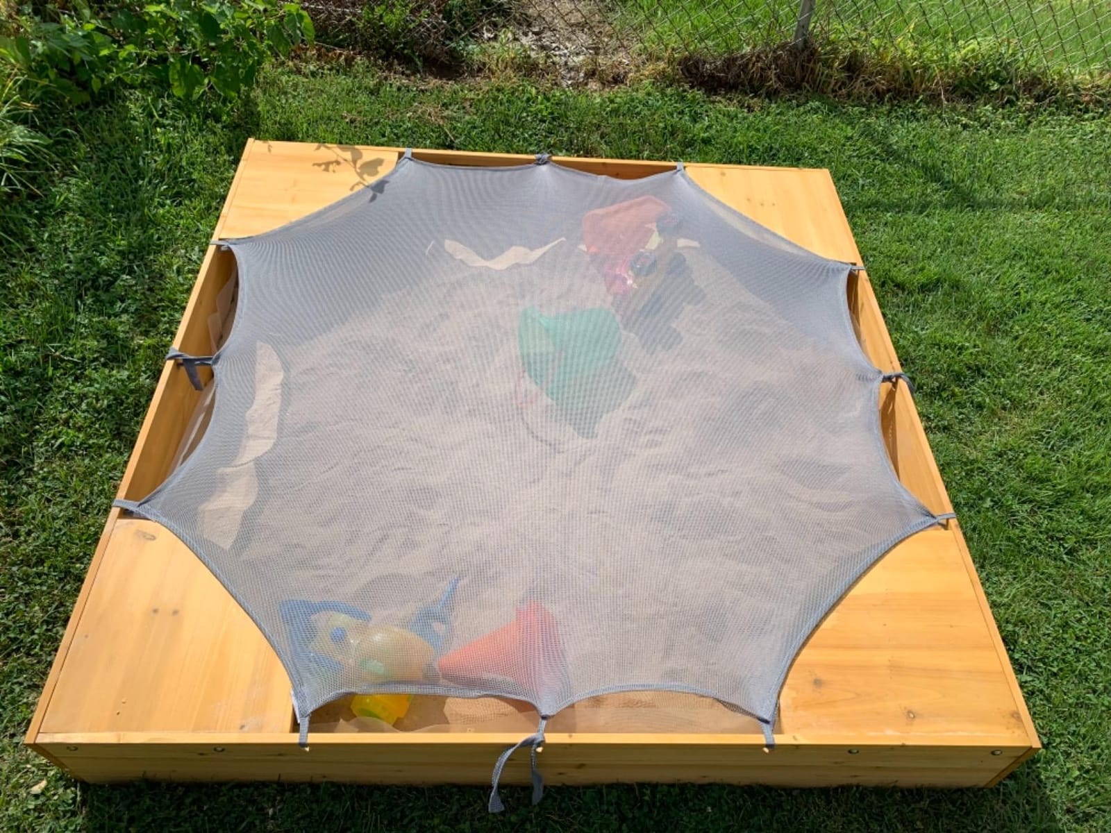 KidKraft Wooden Backyard Sandbox with Built-in Corner Seating and Mesh Cover, Kid's Outdoor Furniture, Honey, Gift for Ages 2-8 customer photo 2
