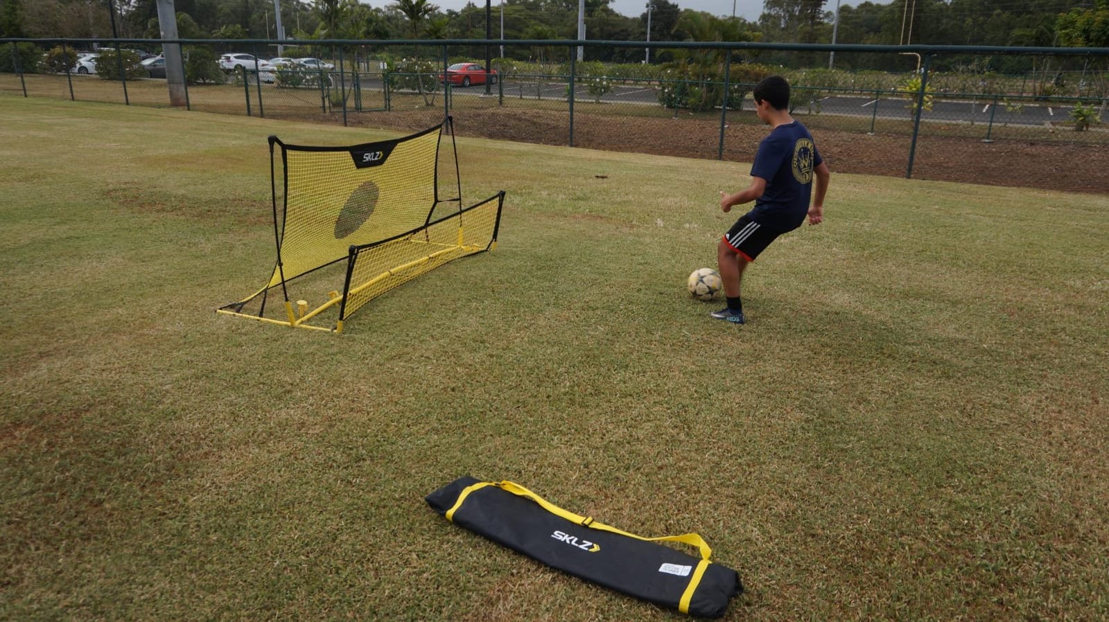 SKLZ Quickster Soccer Trainer - Dual-Sided Rebounder for Solo Passing, Receiving, Trapping Practice - Large & Small Rebound Net - Weather Resistant - Adjustable Frame, Metal Stakes & Carry Bag customer photo 2