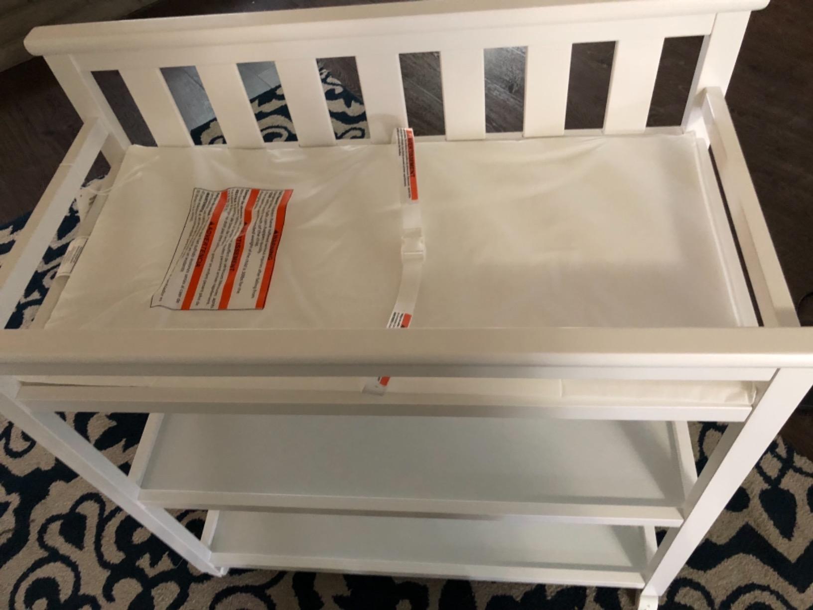 Delta Children Flat Top Changing Table with Wheels and Changing Pad - Greenguard Gold Certified, Bianca White customer photo 2