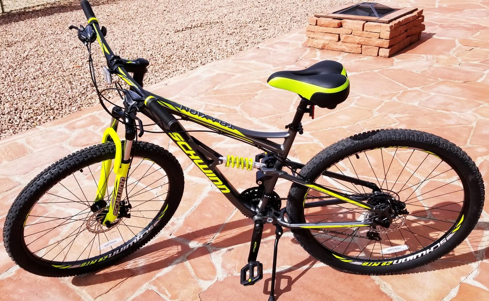 Schwinn Traxion Mountain Bike for Adult Men Women, 29-Inch Wheels, Full Suspension, 24-Speed Shimano Drivetrain, Trigger Shifter, 18-Inch Aluminum Frame, Mechanical Disc Brake, Matte Grey/Neon Green customer photo 1