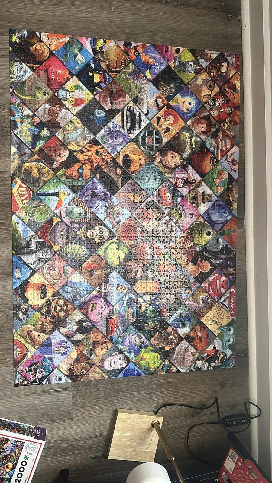 Ceaco - Disney/Pixar Clips - 2000 Piece Jigsaw Puzzle | Officially Licensed, Made in USA, Recycled Board, Finished Size 38.5 x 26.5 in, Includes Poster, Giftable, Frameable customer photo 1