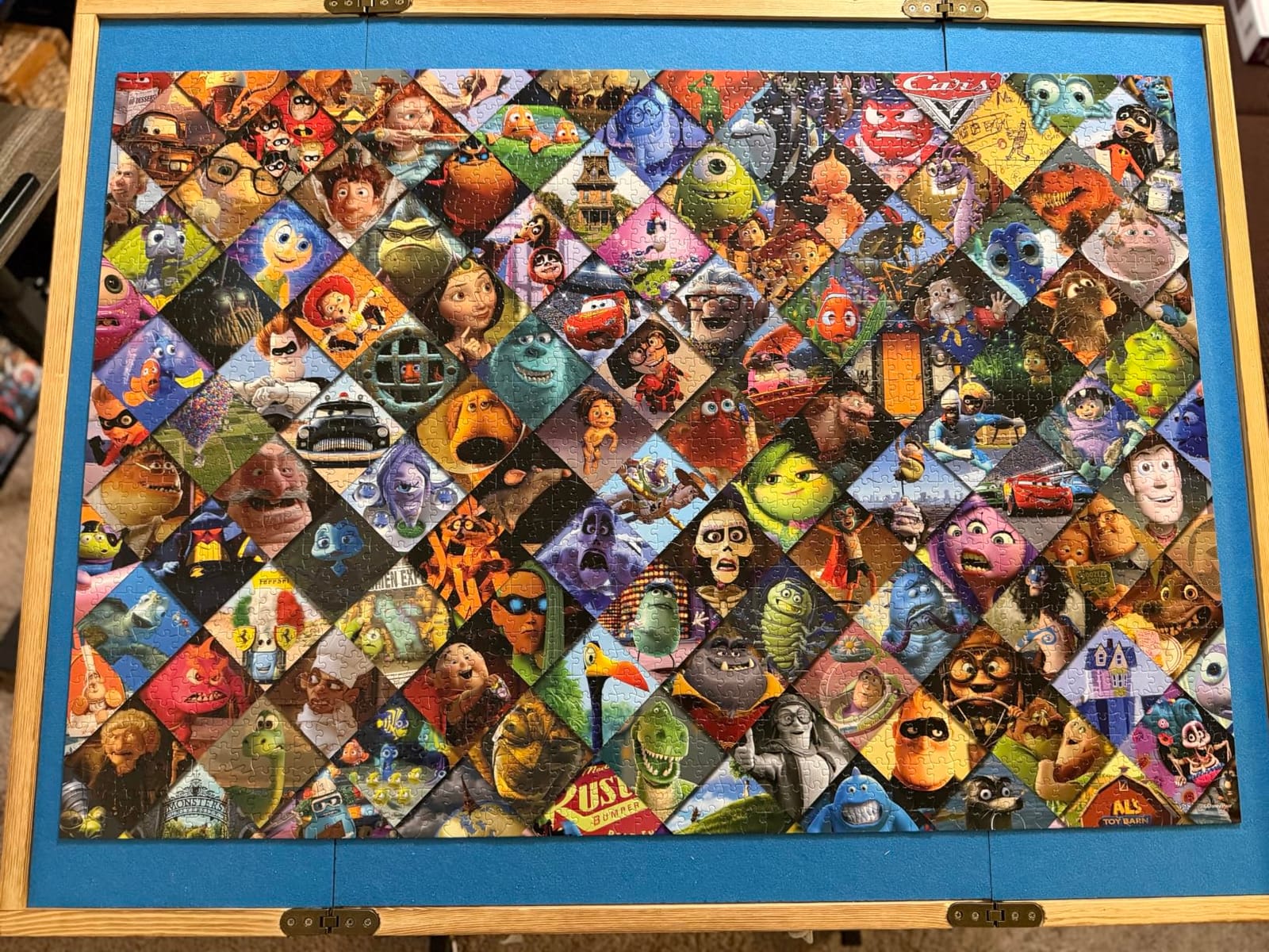 Ceaco - Disney/Pixar Clips - 2000 Piece Jigsaw Puzzle | Officially Licensed, Made in USA, Recycled Board, Finished Size 38.5 x 26.5 in, Includes Poster, Giftable, Frameable customer photo 2