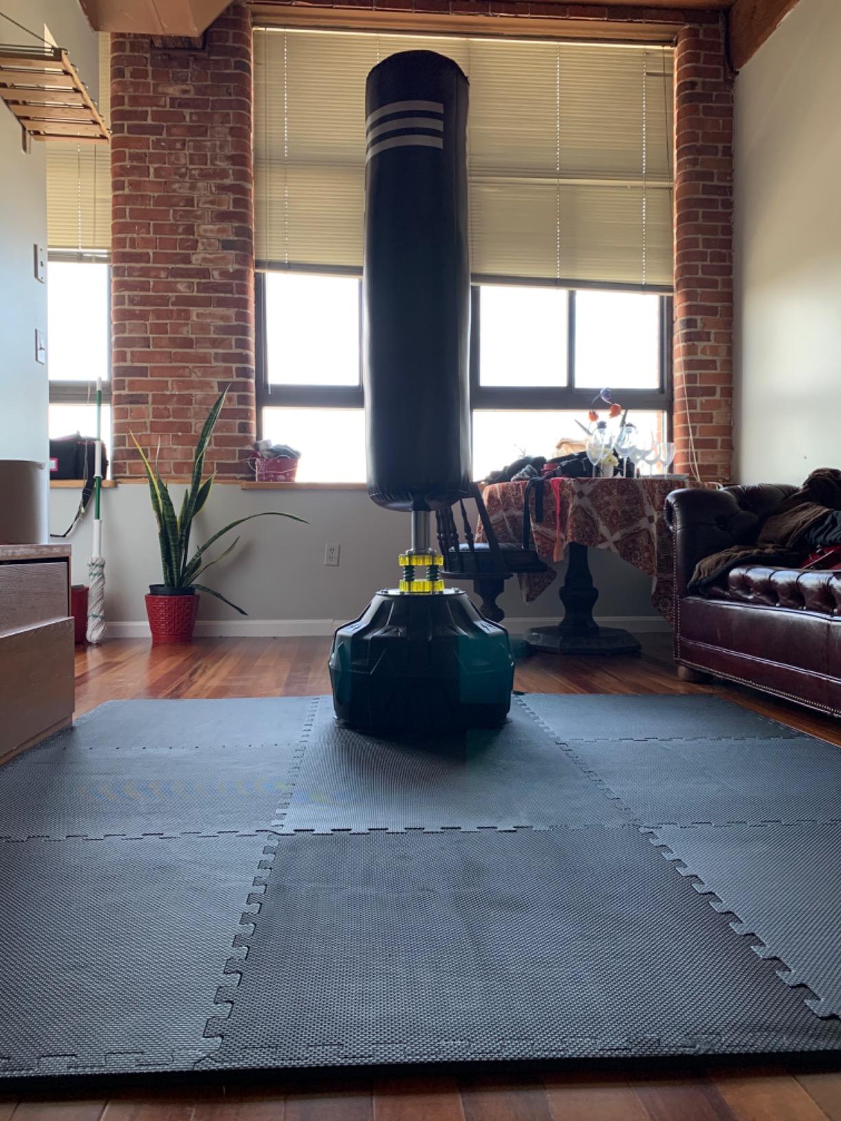 PEXMOR Freestanding Punching Bag Heavy Solid Boxing Bag with Suction Cup Armor Base & Noise Vibration Absorption Device for Adult Youth - Men Stand Kickboxing Bags Kick Punch Bag | Black customer photo 2