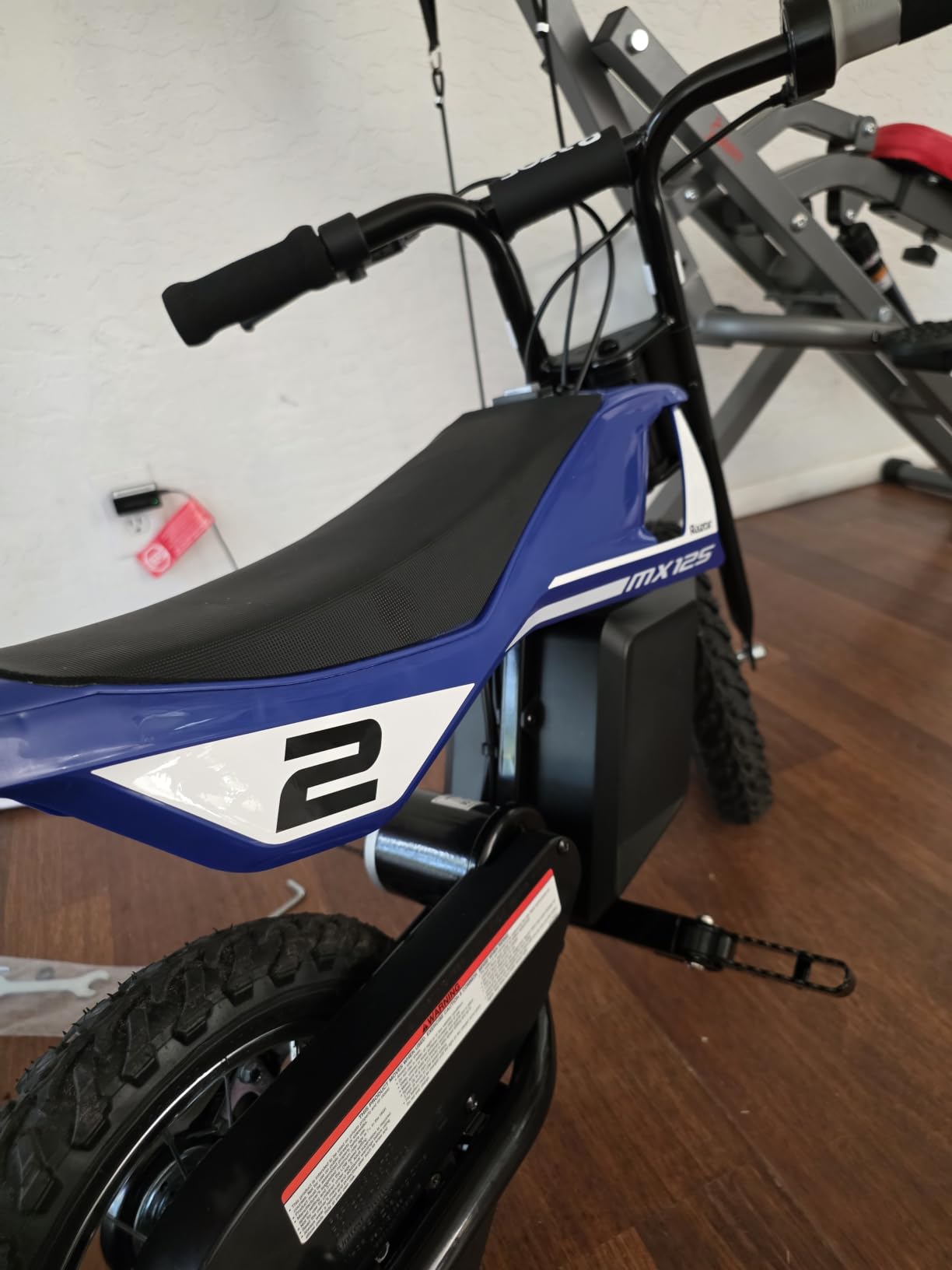 Razor MX125 Dirt Rocket Electric-Powered Bike with Authentic Motocross Geometry, Rear-Wheel Drive,100-watt, high-Torque, Chain-Driven Motor, for Kids 7+, Blue | Iconic Wheeled Ride-On For Kids Age 5+ | Hi/Lo Speed Safety Switch | 100W/12V Motor | Up To 8 MPH, 40 Mins; 78 Lbs customer photo 2