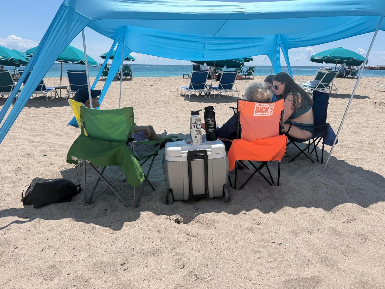 Rhino Valley 10 x 10 FT Beach Tent UPF50+ with 8 Sandbags 4 Poles, Sky Blue customer photo 1