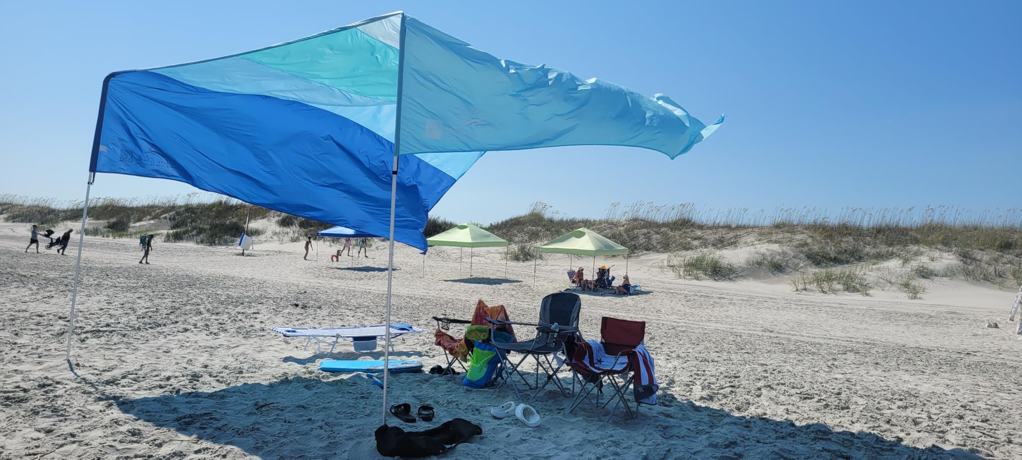 MillionShades® Beach Shade Canopy – No Ropes, No Sandbags, Quiet in Wind, 14x14 ft Wind-Propelled® Beach Shade Sail, UPF 50+, Grande for 10+ People customer photo 1